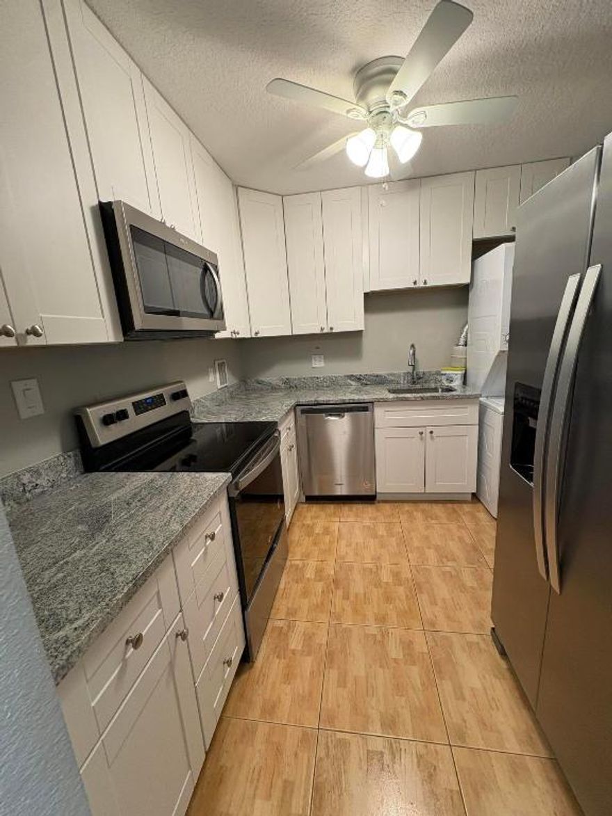 Lovely 2 BD, 1.5 Baths for rent for tenants 55 years old or older.
The condo is located on the first floor, very close to common patio overlooking a lake.
The modern kitchen has stainless steel appliances, new cabinets, granite countertops. The 1.5 bathrooms are updated with nice ceramic tiles. There is a washer/dryer in the unit.  Come and enjoy living in paradise. Century Village has many amenities to offer to residents, like over a 1000 seat clubroom to watch shows and movies, indoor and outdoor pools, medical facilities, beauty shop, tennis, boating and more. Close proximity to PBI airport, restaurants, shops and beach. Located about six miles west of Downtown West Palm Beach, Century Village Palm Beach is a gated community for active seniors.