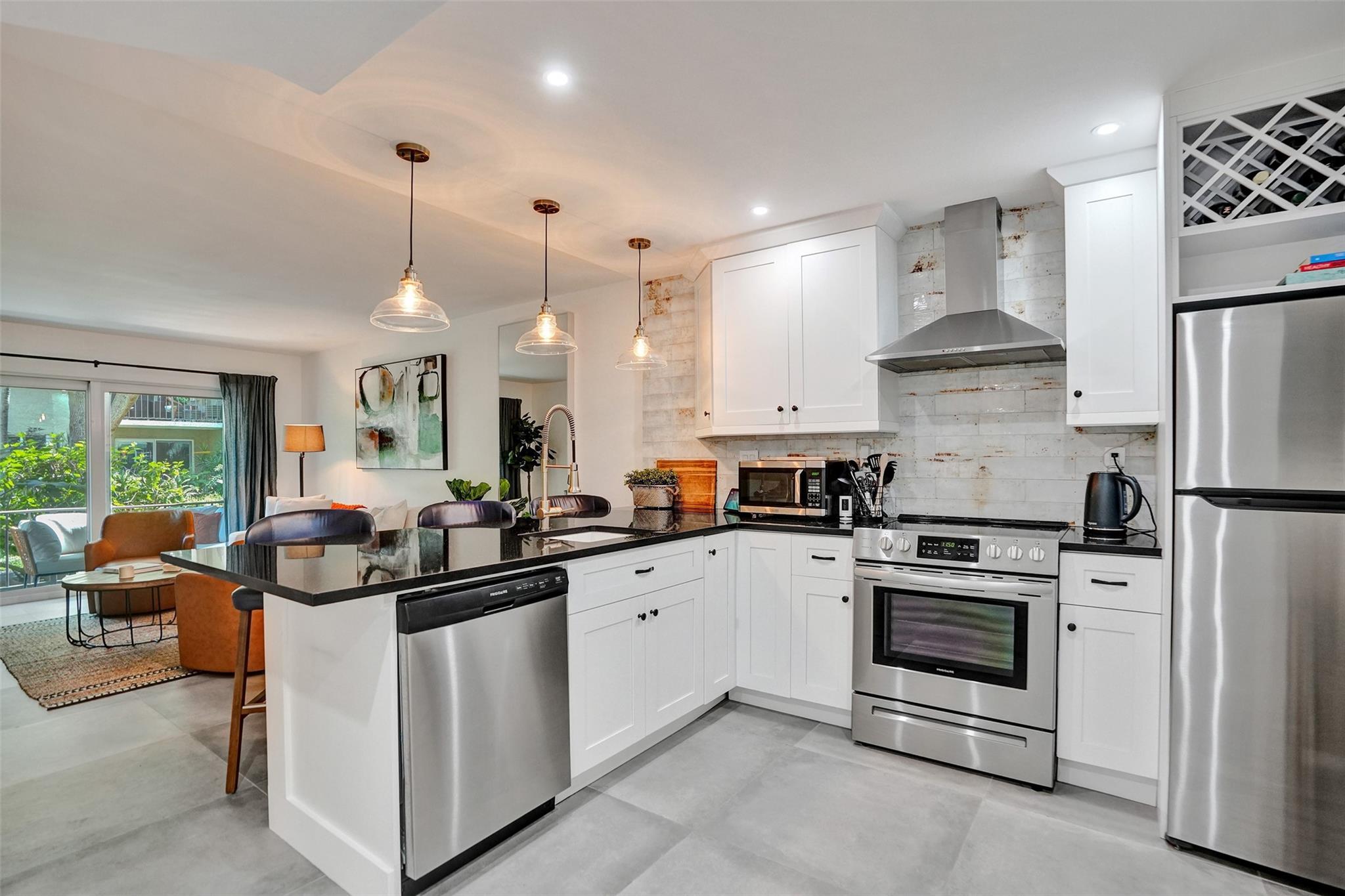 Tastefully-remodeled, first-floor condo in the heart of Wilton Manors. This contemporary 1 bed, 1 bath has been updated with an eye for design, and meticulously maintained to create a fresh and inviting space. This unit truly gives you the best of both worlds; From the peaceful patio in the courtyard of River Manor Condominiums' offering tranquil living just steps from the pool and canal-views, yet just a few minutes from the vibrant and lively Wilton Drive, which provides endless options for restaurants, entertainment, and nightlife. For your convenience, this unit is being offered fully furnished, making this a completely turnkey opportunity for an easy move. Water and internet included. No pets.