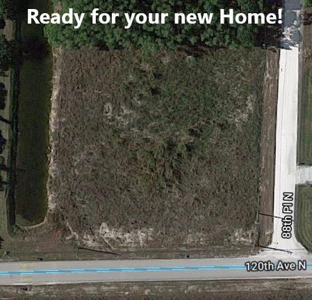 Fully Cleared Over sized Corner lot. Paved road facing Bayhill country club from this build ready lot. Lot has had over 100 loads of #1 fill delivered, spread and compact for new building pad. 30 loads of #2 yard fill. Septic permit issued by health department, deposit paid to the septic company for 1050 gallon septic tank and 700 sq ft drain field. Main house and Garage permits have deposits applied, Initial boundary Survey, site plan, lot drainage plan, topography survey and elevations all complete and paid for. Full house plans with detached garage (included is the floor plan and elevations in photos).Grab this land and build, ready for your new home.