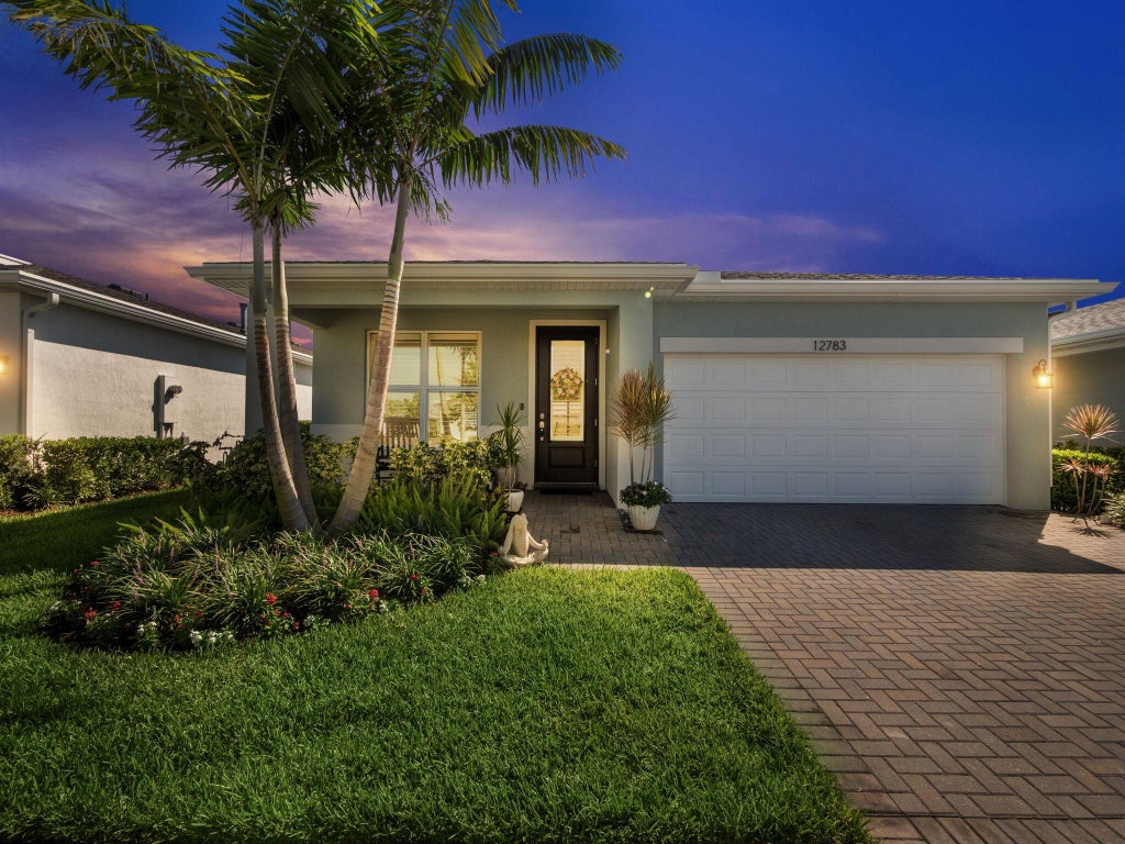 Photo of 12783 SW Phoenix Drive, Port Saint Lucie, FL 34987 (MLS # R11008896)