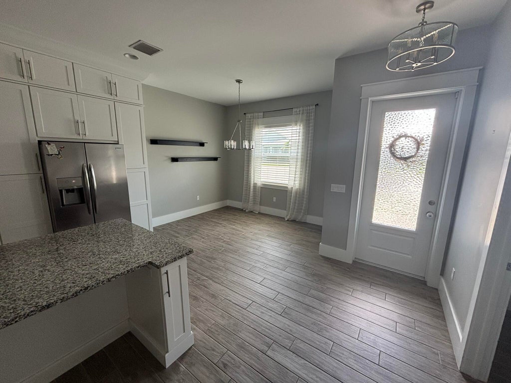 Photo of 3451 SW Loggerhead Court, Palm City, FL 34990 (MLS # B26075112)