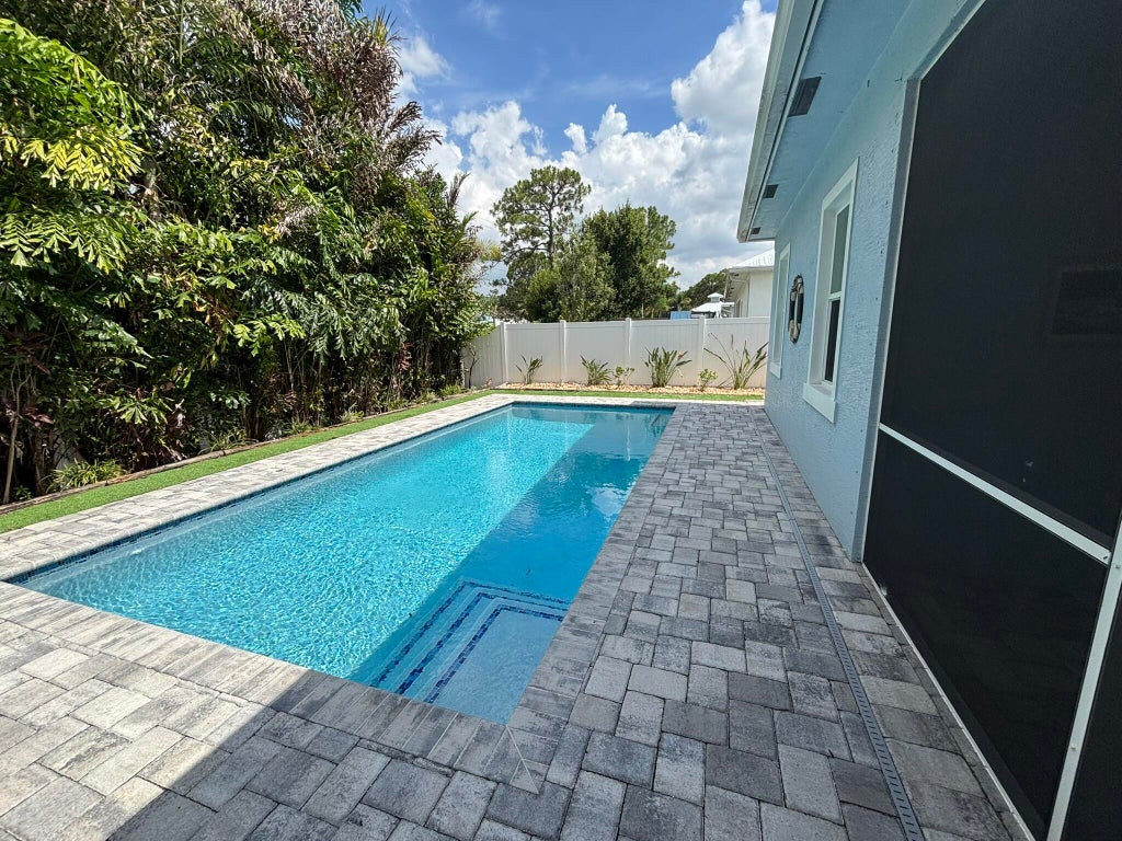 Photo of 3451 SW Loggerhead Court, Palm City, FL 34990 (MLS # B26075112)