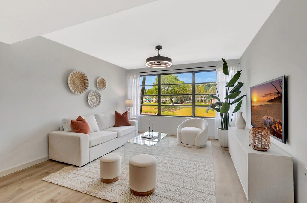 Photo of 6049 Balboa Circle #106, Boca Raton, FL 33433 (MLS # R11086605)