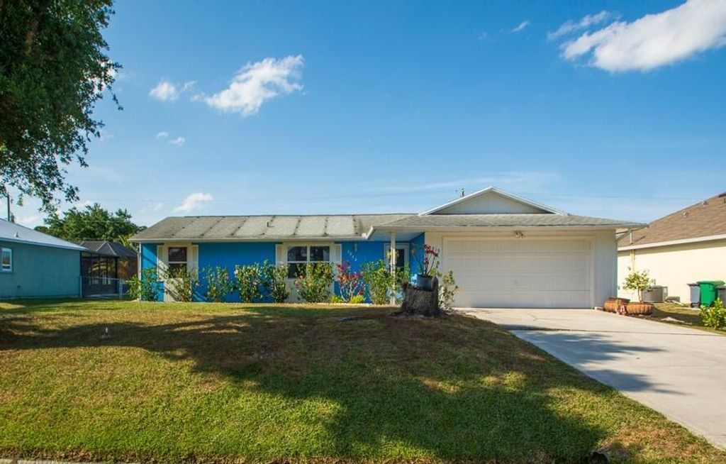 Photo of 1213 SW Asturia Avenue Ave, Port St Lucie, FL 34953 (MLS # R10712524)