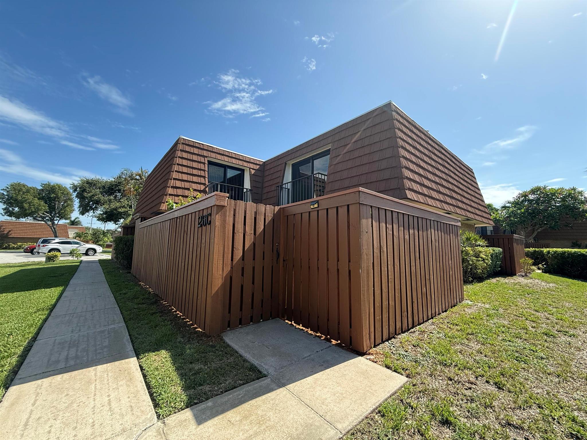 Freshly Painted and all new flooring in this charming 2 bedroom townhome located in Tequesta Hills just across from Constitution Park with tennis, pickleball, and playground. Enjoy Tequesta's coastal charm, boutique shops, cafes, and nearby Jupiter beaches. Annual lease; small pet considered.