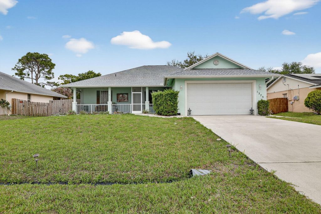Photo of 1373 SW Granville Avenue, Port Saint Lucie, FL 34953 (MLS # B26003810)