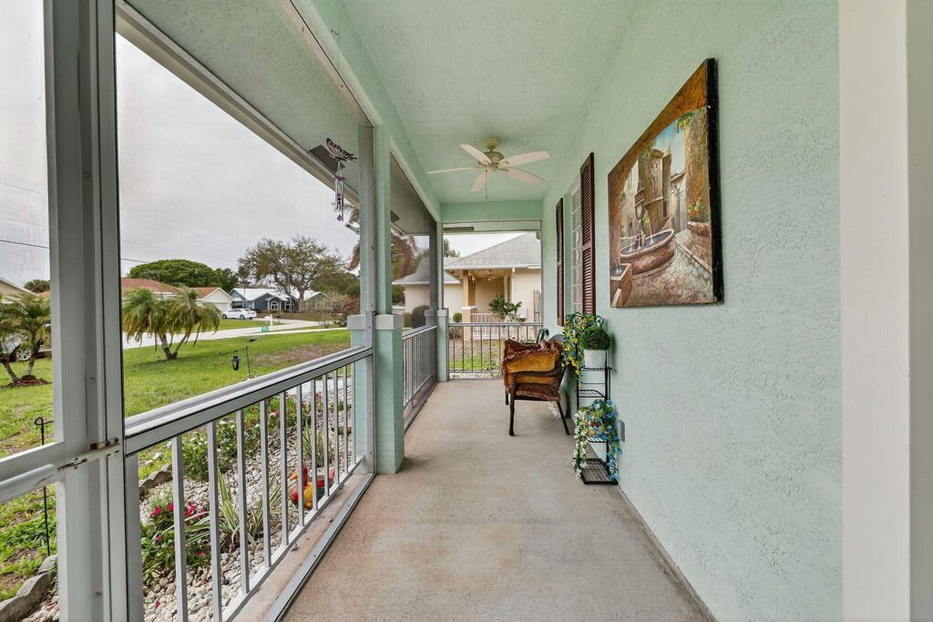 Photo of 1373 SW Granville Avenue, Port Saint Lucie, FL 34953 (MLS # B26003810)