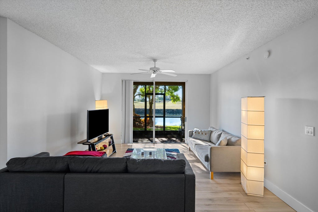 Photo of 11730 SAINT ANDREWS Place #102, Wellington, FL 33414 (MLS # B26091363)