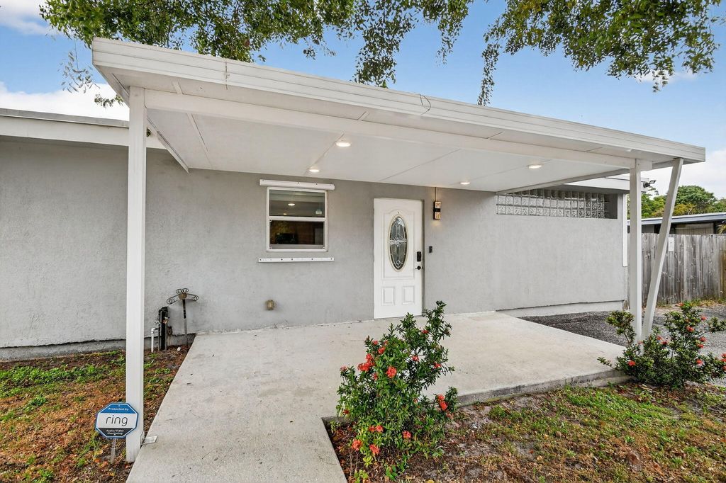 Photo of 419 Cheyenne Drive, Lake Worth, FL 33462 (MLS # R11160458)