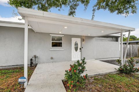 Photo of 419 Cheyenne Drive, Lake Worth, FL 33462 (MLS # R11160458)