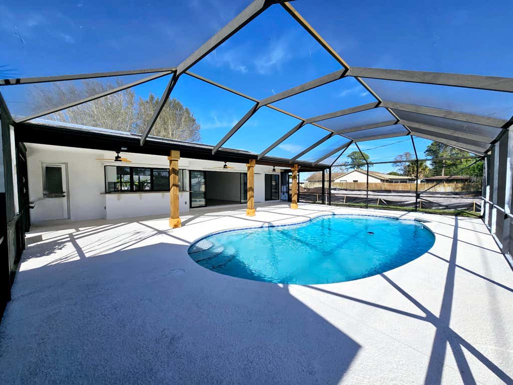 Photo of 350 NE Gulfstream Avenue, Port Saint Lucie, FL 34983 (MLS # R10962266)