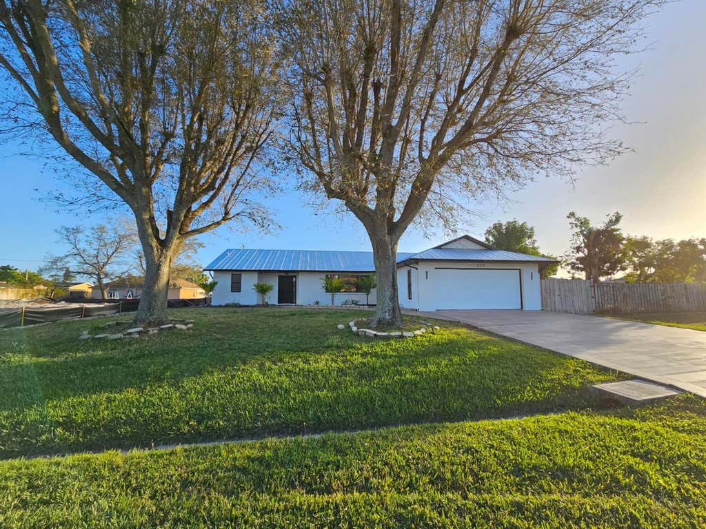 Photo of 350 NE Gulfstream Avenue, Port Saint Lucie, FL 34983 (MLS # R10962266)