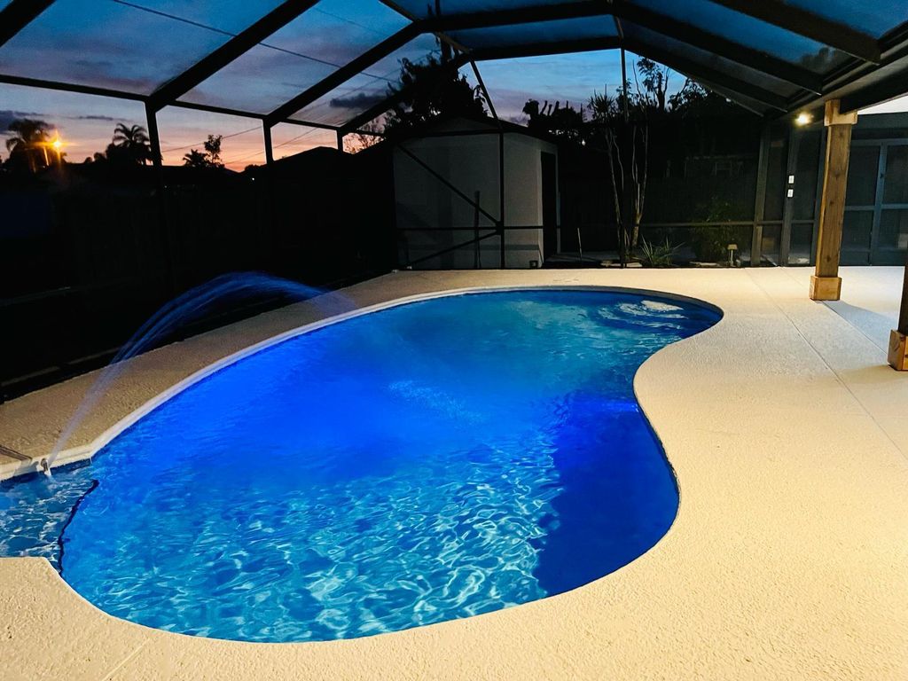 Photo of 350 NE Gulfstream Avenue, Port Saint Lucie, FL 34983 (MLS # R10962266)