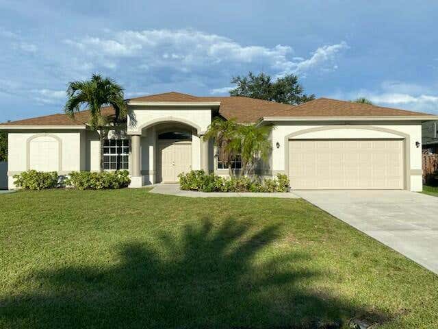 Photo of 2357 SW Norton Street, Port Saint Lucie, FL 34953 (MLS # B26029663)