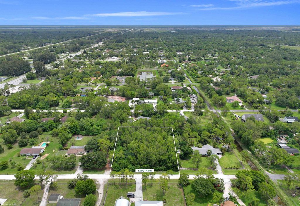 Photo of 16287 Stallion Drive E, Loxahatchee, FL 33470 (MLS # R10908426)