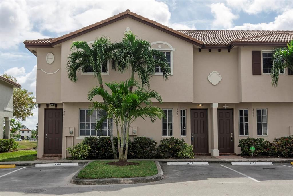 Photo of 4205 Napoli Lake Drive, Riviera Beach, FL 33410 (MLS # R10685642)