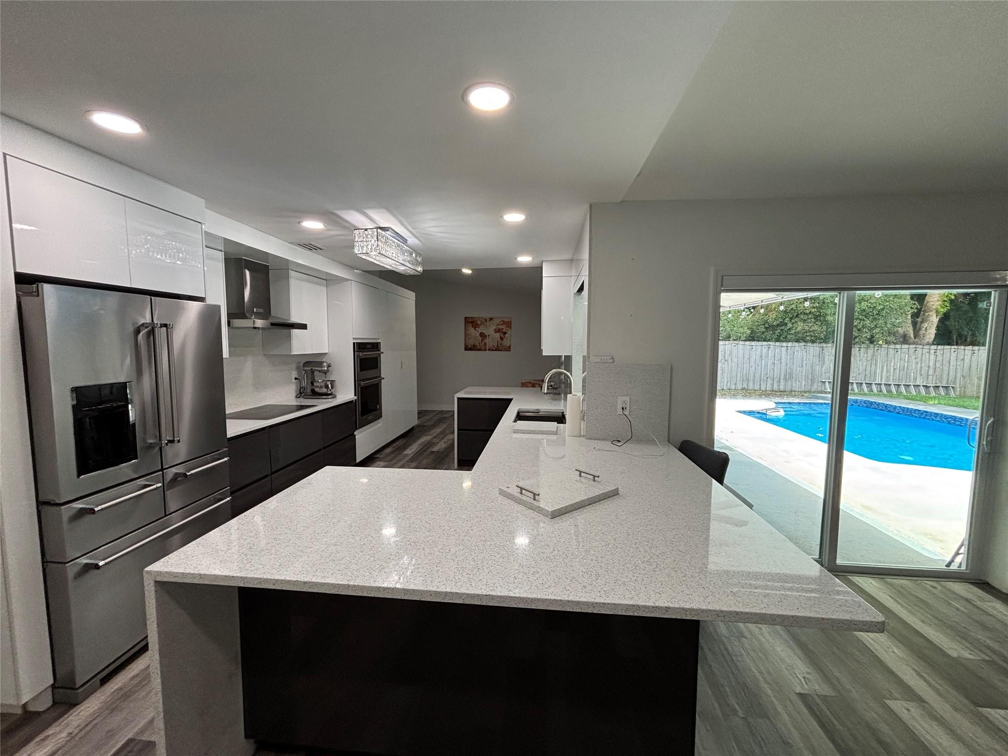 Tucked away at the end of a quiet cul-de-sac, this beautifully renovated home offers the perfect blend of privacy and modern comfort. Inside, a thoughtfully designed split floor plan features three spacious bedrooms plus a versatile bonus room, ideal for a home office or guest space. The primary suite opens directly to your private backyard. The fully remodeled kitchen and bathrooms showcase sleek, contemporary finishes.
Step outside to a fully fenced backyard with a sparkling pool, perfect for entertaining, playing, or peaceful relaxation. Best of all, pool maintenance is included, so you can simply move in and enjoy. Conveniently located just minutes from top-rated schools, major highways, and everyday essentials. Pets welcome