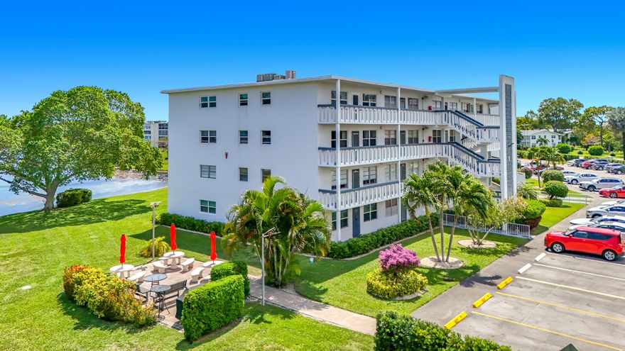 Lake View End Unit. Bright & Spacious 2 Bedroom 2bath Condo. New Roof-2026. Offered Completely Furnished. Ameneties Include: Theater, Live Shows, Fitness Center, Pickle & Tennis Ball Courts, Indoor & Outdoor Swimming Pools, Shuttle Service, Fine Dining. Just Minutes to the Beach. 55+ Community.