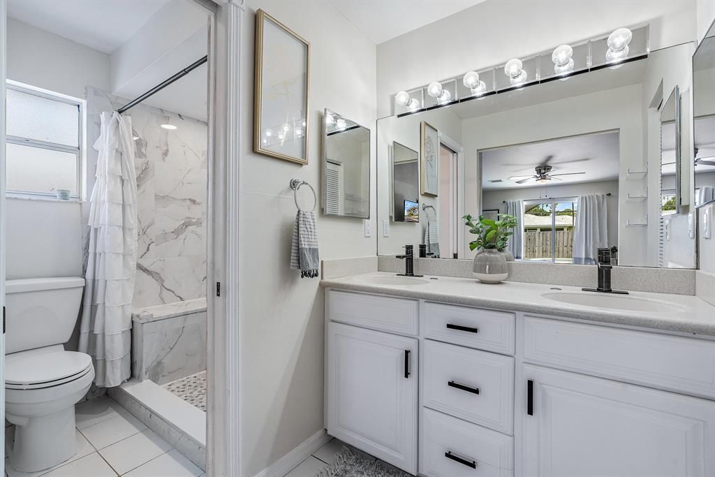 Photo of 3842 SW Ridley Street, Port Saint Lucie, FL 34953 (MLS # R10818139)