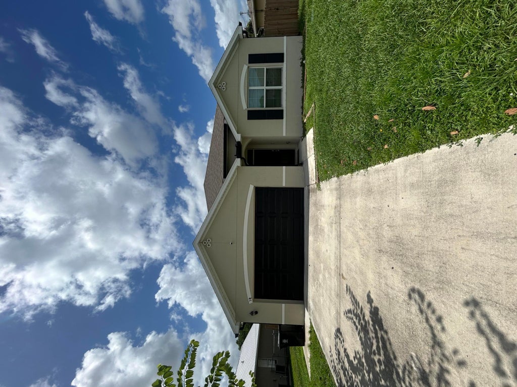 Photo of 341 SW RIDGECREST Drive, Port Saint Lucie, FL 34953 (MLS # B26077557)