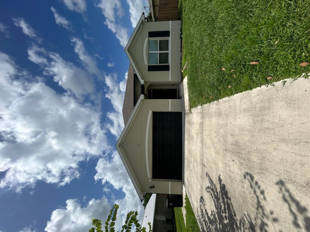 Photo of 341 SW RIDGECREST Drive, Port Saint Lucie, FL 34953 (MLS # B26077557)