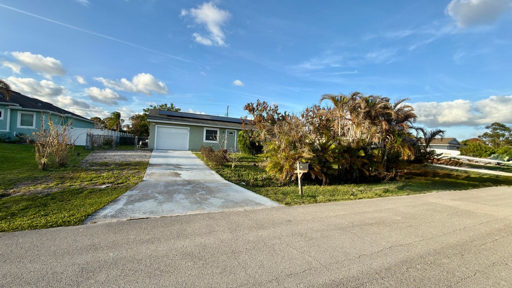 Photo of 533 SW Crawfish Drive, Port Saint Lucie, FL 34953 (MLS # B26016056)