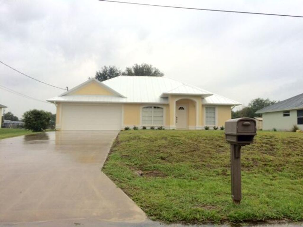 Photo of 3832 SW Hale Street, Port Saint Lucie, FL 34953 (MLS # B26047916)