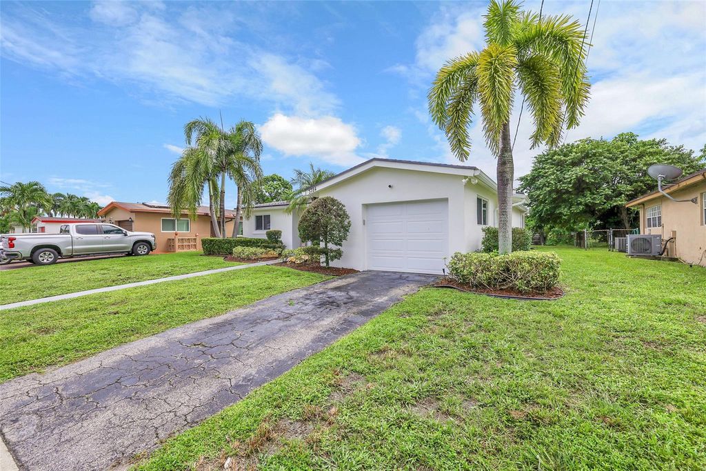Photo of 3784 NW 37th Street, Lauderdale Lakes, FL 33309 (MLS # F10527899)