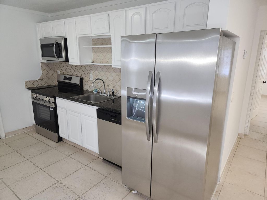 Photo of 210 NW 13th Avenue, Delray Beach, FL 33444 (MLS # B26013200)