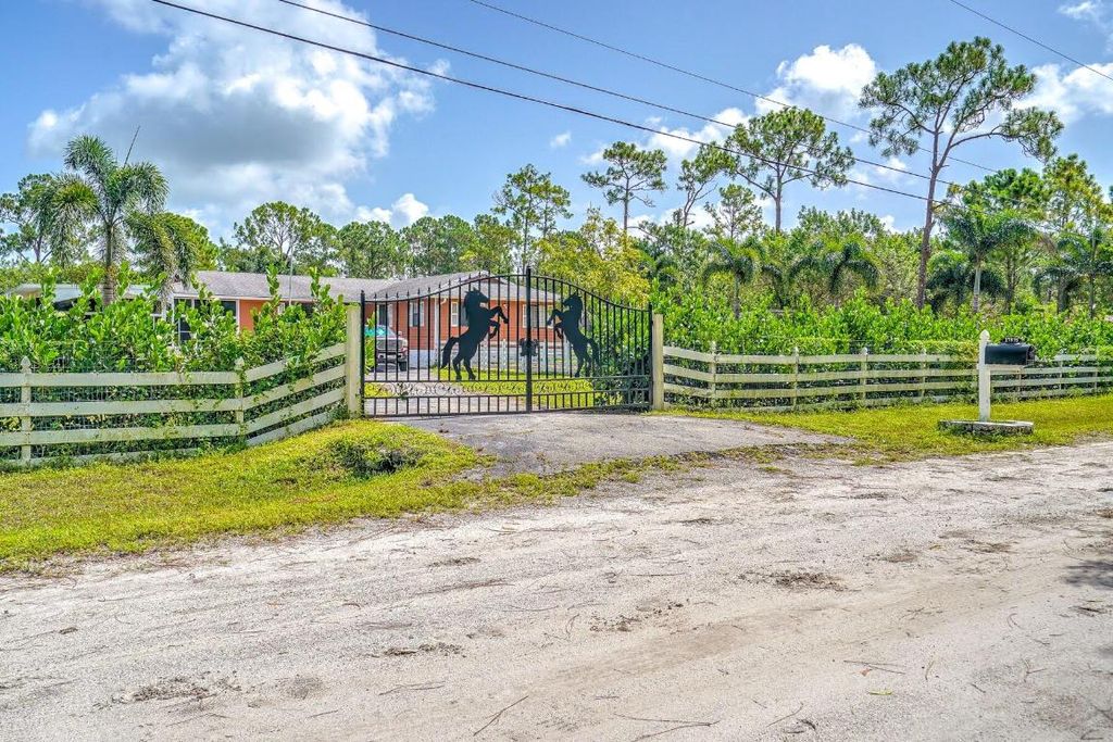 Photo of 17875 42nd Road N, Loxahatchee, FL 33470 (MLS # R10950338)