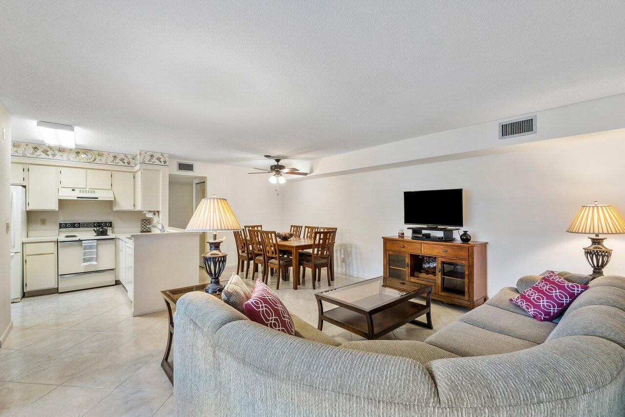 Desired 1st level unit turnkey condition. 2 bedroom 2 bathroom with eat in kitchen and tiled flooring throughout. Screened in patio with hurricane shutters and enclosed laundry room. Community pool walking distance & designated parking spot. Full access to the newly renovated Huntington Lakes Clubhouse expected to reopen spring 2022. Featuring theatre with live shows, indoor and outdoor pools with sauna & steam rooms, as well as exercise room, tennis, pickleball & racquet courts. Primary location nearby Atlantic Ave and Downtown Delray as well as beaches. Walking distance to Oriole Plaza with dining and grocery shops including Publix. 22 miles to Palm Beach Airport and 35 miles to Fort Lauderdale Airport.