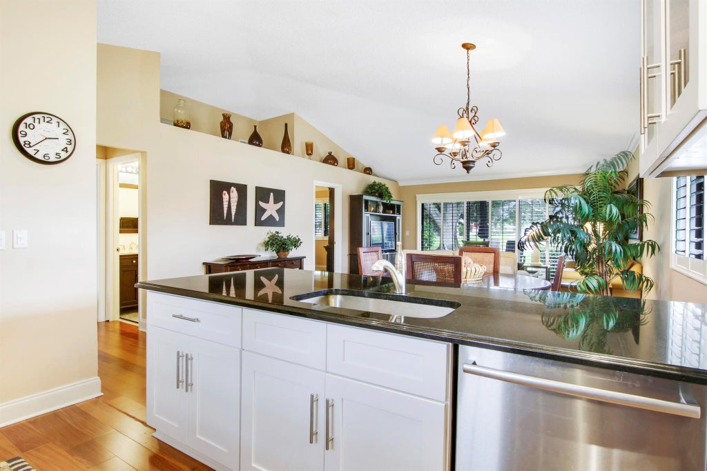 Photo of 915 Club Drive, Palm Beach Gardens, FL 33418 (MLS # R10974887)