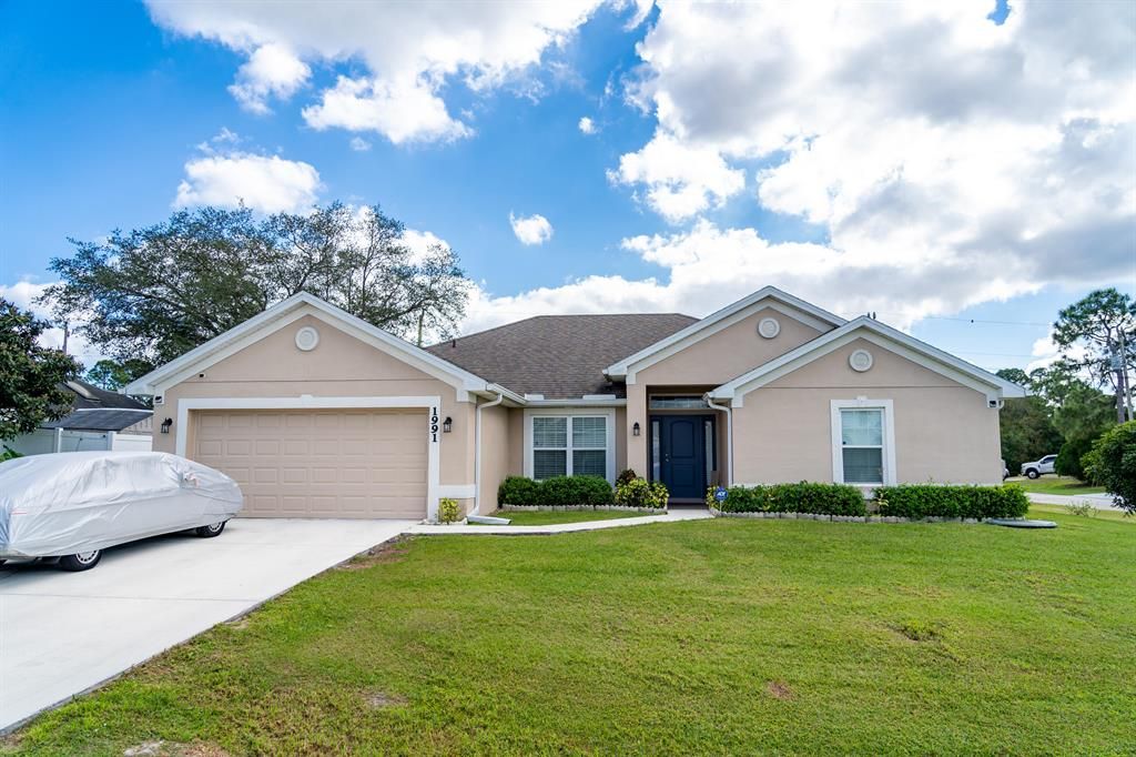 Photo of 1991 SW Diamond Street, Port Saint Lucie, FL 34953 (MLS # R10767086)
