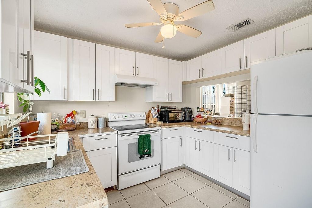 Photo of 401 SW Godels Street, Port Saint Lucie, FL 34953 (MLS # R11059503)