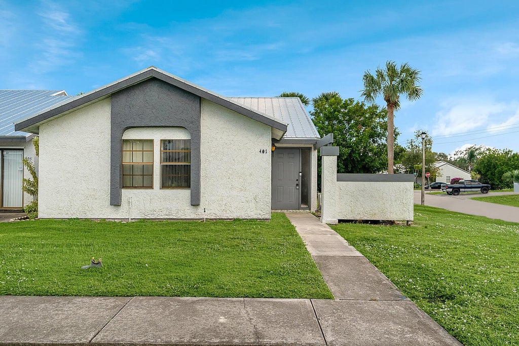 Photo of 401 SW Godels Street, Port Saint Lucie, FL 34953 (MLS # R11059503)