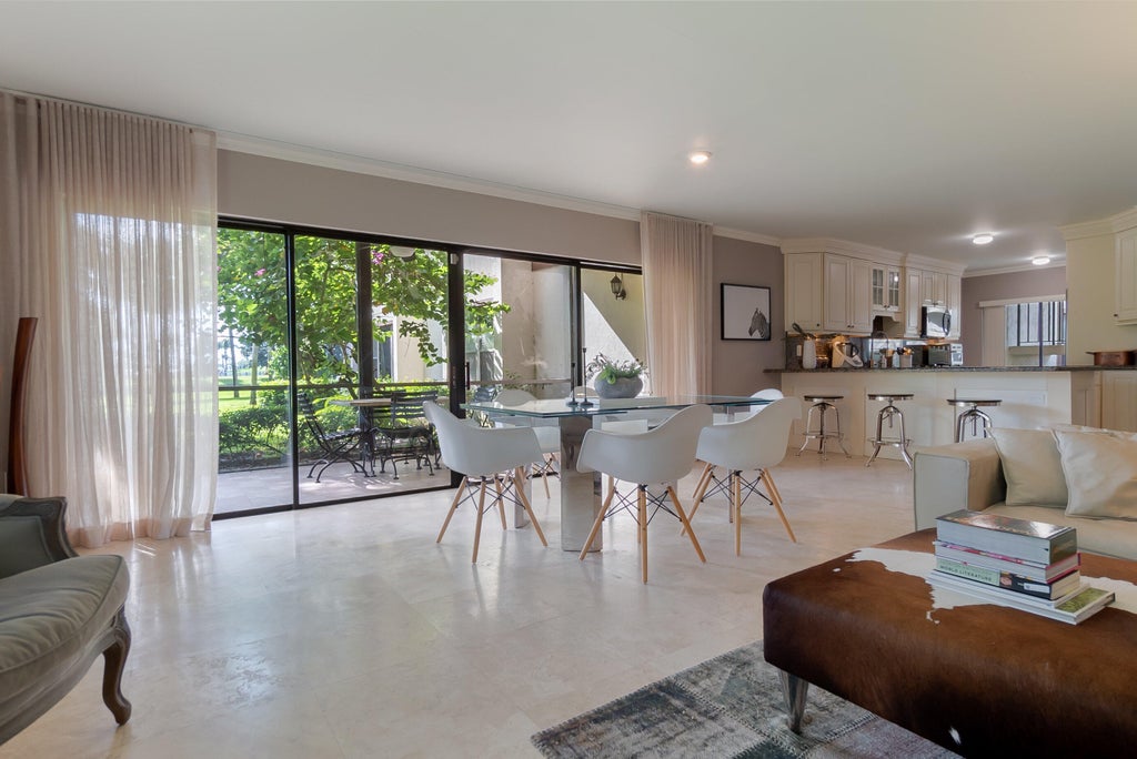 Photo of 13400 Polo Road W #104, Wellington, FL 33414 (MLS # B26056993)