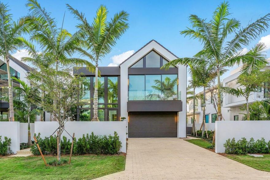 In Delray Beach's sought-after Palm Trail neighborhood, 508 NE 7th Avenue, Delray Beach, FL 33483 is a modernist masterpiece by Stamm Development Group. This expansive 4-bedroom, 4.2-bathroom single-family home with an additional flex room, offers 5,531 total square feet of luxurious living,. Pass through the front entry and be captivated by the home's open floor plan, showcased within the grand double-height foyer. Abundant natural light bathes the spacious ground floor, where the kitchen seamlessly transitions into the great room and dining area. The open floor plan revolves around a stunning gourmet kitchen, designed for both everyday meals and grand occasions. High-end features include a top-of-the-line gas range, a large island with bar seating, and a spacious walk-in hidden pantry to keep your ingredients organized. Adjacent to the kitchen, an expansive wet bar seamlessly integrates with the great room, creating a perfect flow for entertaining or simply relaxing with a drink. Floor-to-ceiling glass doors blur the lines between indoors and outdoors, leading to a private backyard oasis. Relax under the covered loggia, prepare meals in the summer kitchen, or cool off in your sleek pool. Pearl House also has a cabana bath accessible from the exterior, conveniently located for you and your guests when utilizing the outdoor amenities of the home. A large club room doubles as a flex space, perfect for an office or playroom, as well as a modern half bath completes this first level.

The second floor promises a haven of tranquility. The primary suite boasts tall ceilings and expansive sliding glass doors that open onto a private balcony, inviting in natural light and coastal breezes. A large walk-in closet and sleek primary his and her baths, feature a soaking tub, dual vanities, and dual water closets, creating a spa-like retreat within your own home. Three additional bedrooms, each with an ensuite bath, ensure privacy for family or guests. A large laundry room, an elevator, smart home technology pre-wire, and modern trim work throughout further elevate the luxurious experience. Live the iconic Delray Beach lifestyle at Pearl House, a masterpiece of design that redefines luxury living.

Disclaimer: The information published & provided including but not limited to prices, measurements, square footages, lot sizes, features, finishes, and calculations are subject to errors, omissions or changes without notice. All such information should be independently verified. All parties should perform their own due diligence on pre-construction sales to verify all information.

List Price reflects an Unfurnished Offering Price.

Developer fee of 1.5% of the purchase price at closing.