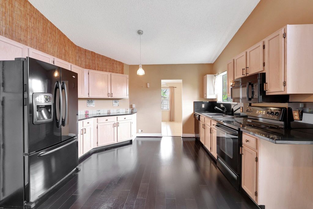 Photo of 307 SE Navy Avenue, Port Saint Lucie, FL 34984 (MLS # R11031263)