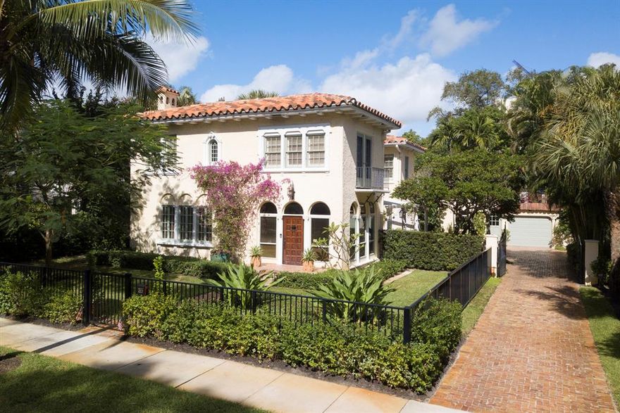 A feeling of sophistication and elegance abounds throughout this fabulous El Cid masterpiece. Located on the Lake block with Intracoastal views, this home has been cleverly updated to retain the charm and uniqueness of the roaring 20's while incorporating the best of modern components, far exceeding today's expectations. Spacious rooms with soaring ceilings, leaded glass windows with ornate hardware, a cast stone fireplace, a dual staircase, and museum quality hardwood with decorative floors all work harmoniously to make this home spectacular. The gourmet kitchen has been completely redesigned with custom cabinets, custom lighting, beautiful marble countertops, and the finest appliances all co-existing with the original architectural details from the Mizner era, leaving