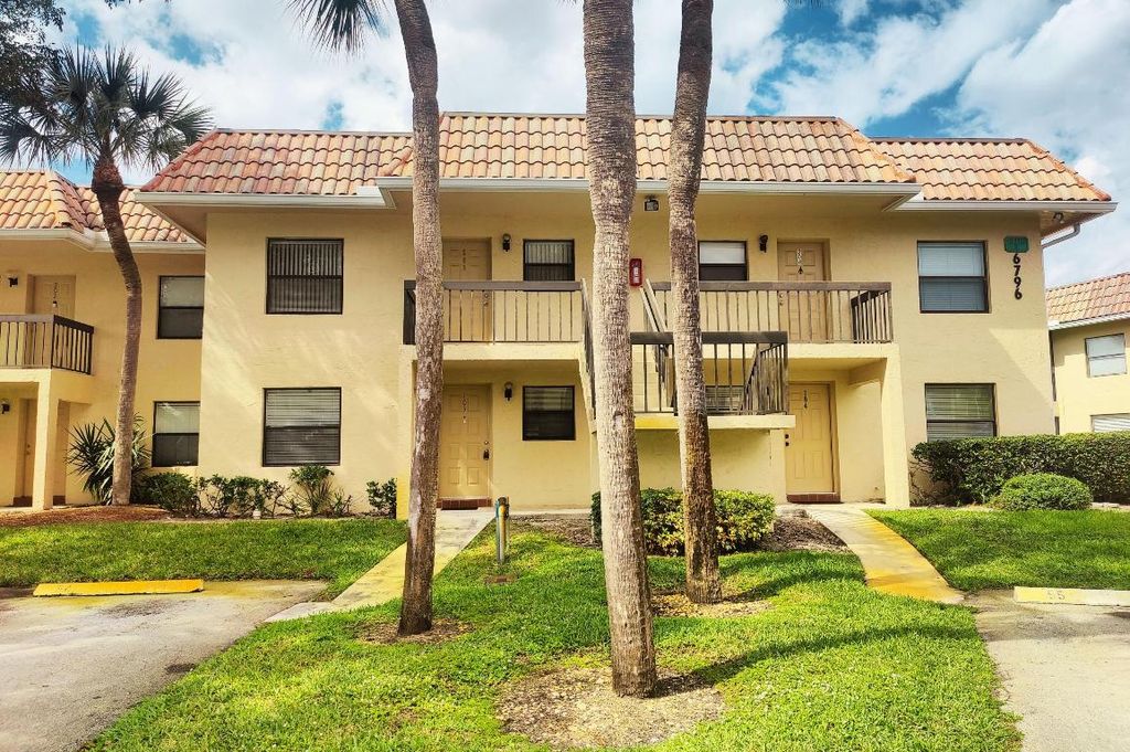 Photo of 6796 Palmetto Circle #203, Boca Raton, FL 33433 (MLS # R10957284)