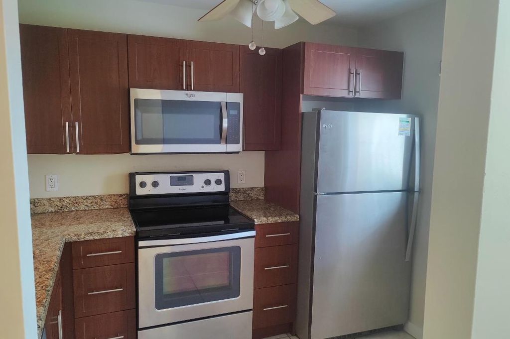 Photo of 6796 Palmetto Circle #203, Boca Raton, FL 33433 (MLS # R10957284)