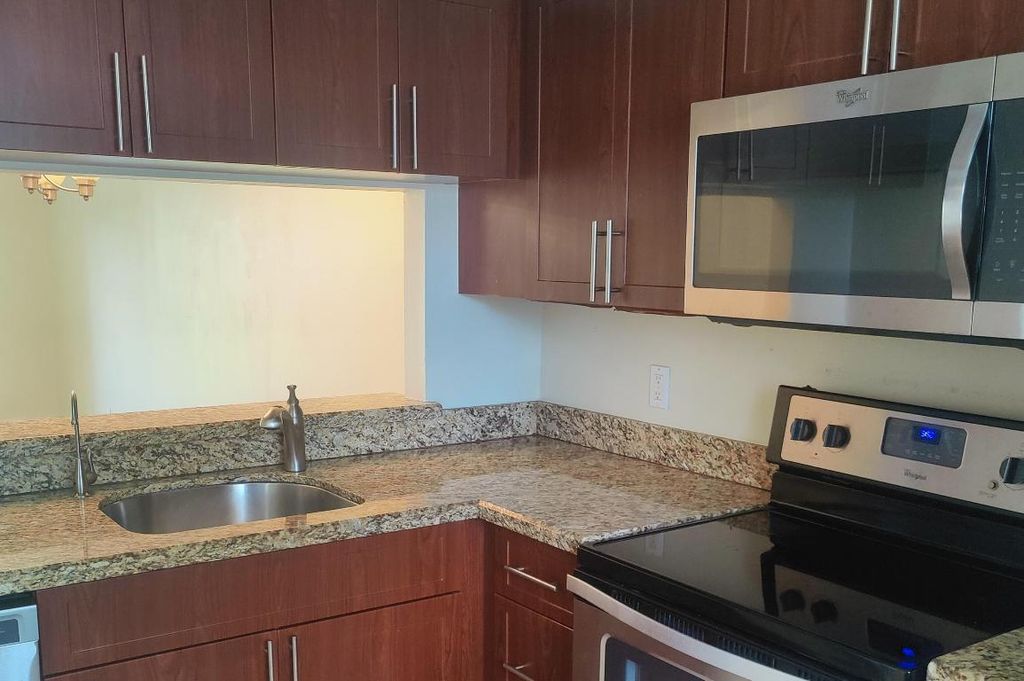 Photo of 6796 Palmetto Circle #203, Boca Raton, FL 33433 (MLS # R10957284)