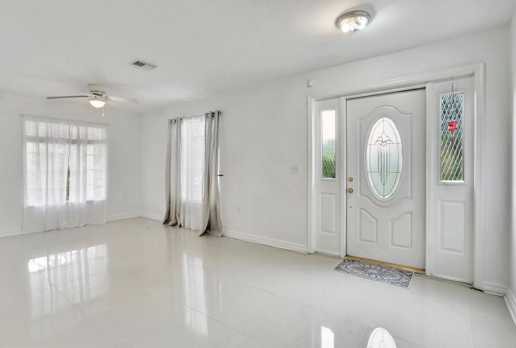 Photo of 325 Glenn Road, West Palm Beach, FL 33405 (MLS # R10926591)