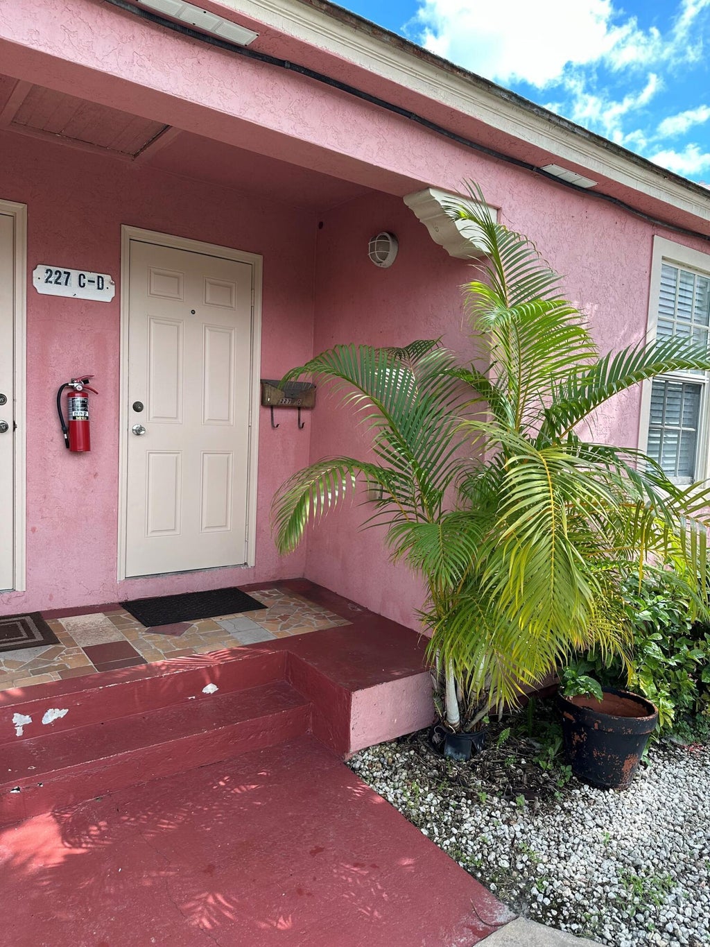 Photo of 227 FORESTERIA Drive #D, Lake Park, FL 33403 (MLS # B26077022)