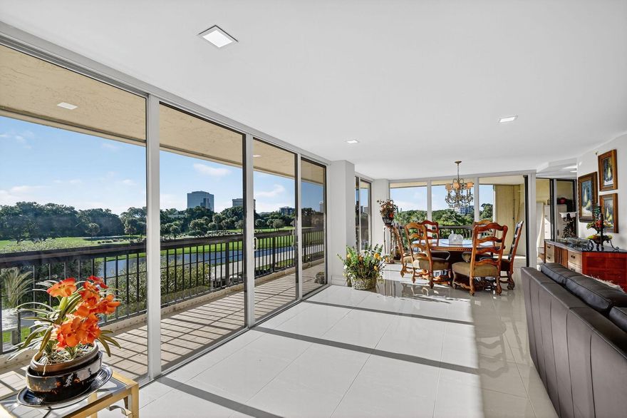 BEAUTIFULLY RENOVATED and bathed in natural light, this stunning and 3BR/2BA corner residence offers a seamless blend of space and elegance with beautiful large porcelain tile floors, wall-to-wall floor-to-ceiling windows, and an expansive wraparound balcony of over 800 sq. ft. Master Bedroom is rare extended, larger version. Enjoy spectacular east-facing sunrise and bright southern exposure overlooking golf course and pool. One covered parking, extra storage, ample guest parking.The Consulate--known as the Grande Dame of the Lands of the President--delivers resort-style living with 24/7 concierge & doorman, on-site manager, golf cart valet, fitness center, renovated lobby, club room, pool, spa-hot tub, tennis, pickleball, basketball, party room, library & appliance & A/C service contract.