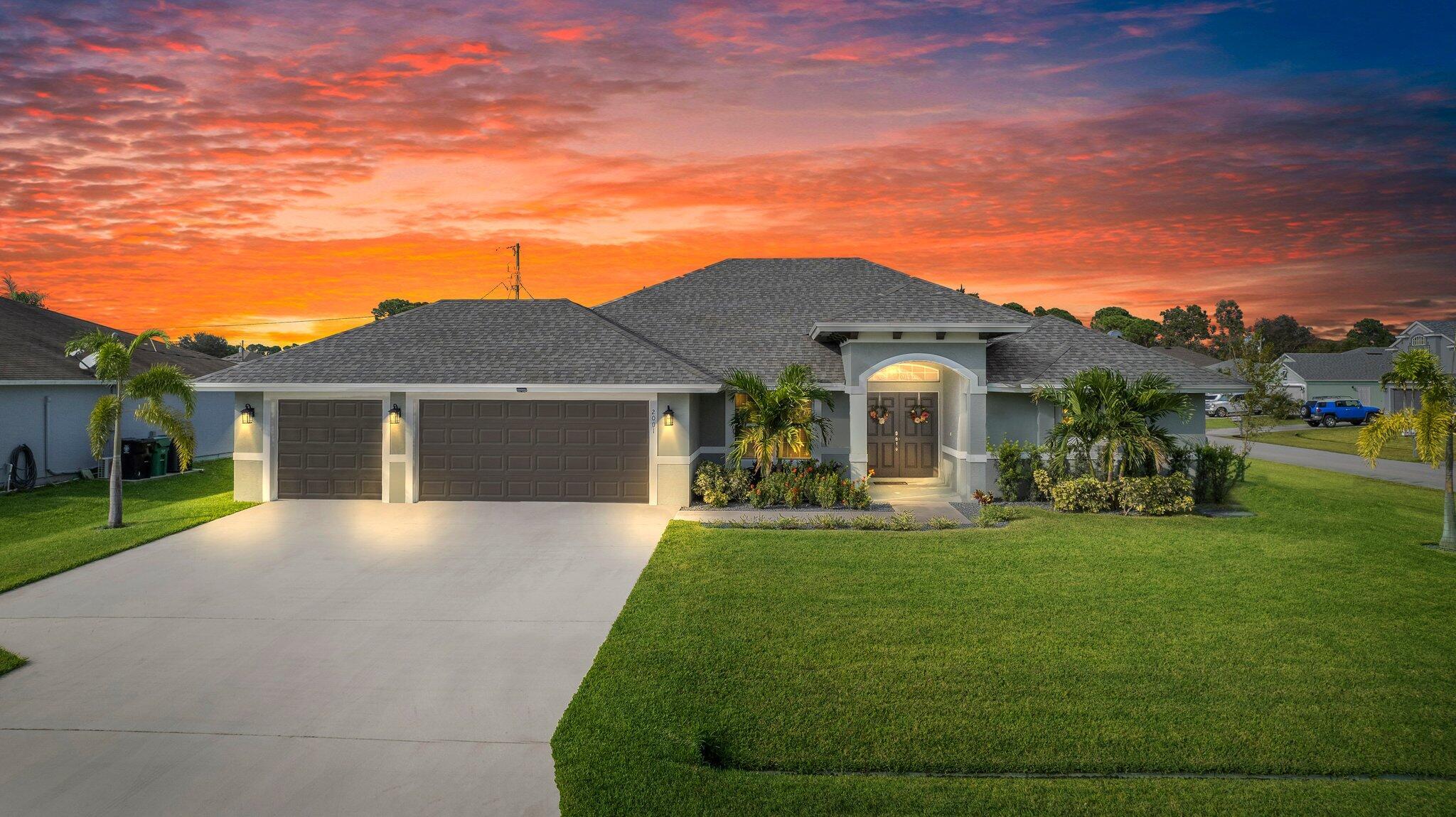 Walk through your double front doors into the lovely foyer of your 2022 Barbados model home, crafted by highly desirable Grande Construction. This stunning property offers over 2200 sqft of living space, featuring 4 beds, 2.5 baths, & a 3-car garage, all situated on an oversized corner lot. This high-caliber home boasts solid CBS construction, impact windows, 18'' diagonal tile throughout, 5.5'' baseboards, & impressive 12' volume ceilings. The open floor plan is perfect for entertaining, w/ a luxurious kitchen that includes a wide granite entertainment bar, stainless steel appliances, beautiful backsplash, modern white cabinets, & triple crown molding. The kitchen flows seamlessly into the spacious family room, which opens to an oversized, private screened porch. The large Primary En-suit