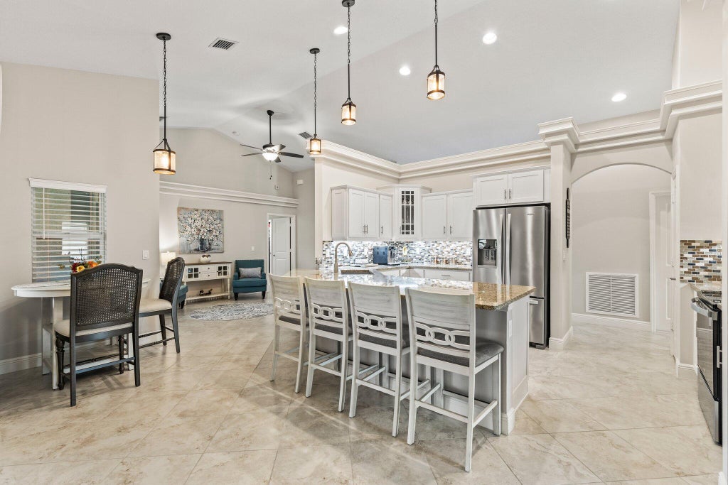 Photo of 2001 SW Grant Avenue, Port Saint Lucie, FL 34953 (MLS # R11029959)