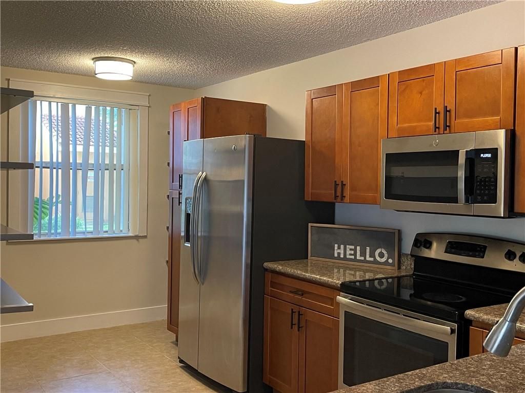 Photo of 8801 Wiles Rd #108, Coral Springs, FL 33067 (MLS # F10304701)