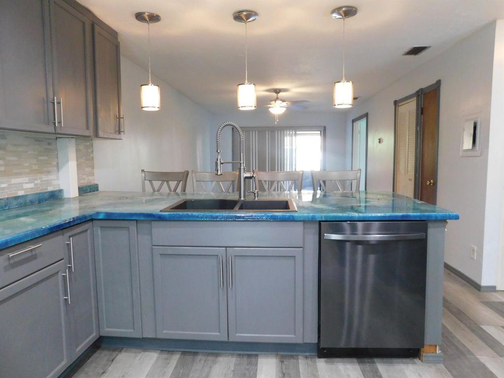 Photo of 6006 Indrio Road #7, Fort Pierce, FL 34951 (MLS # R10929234)