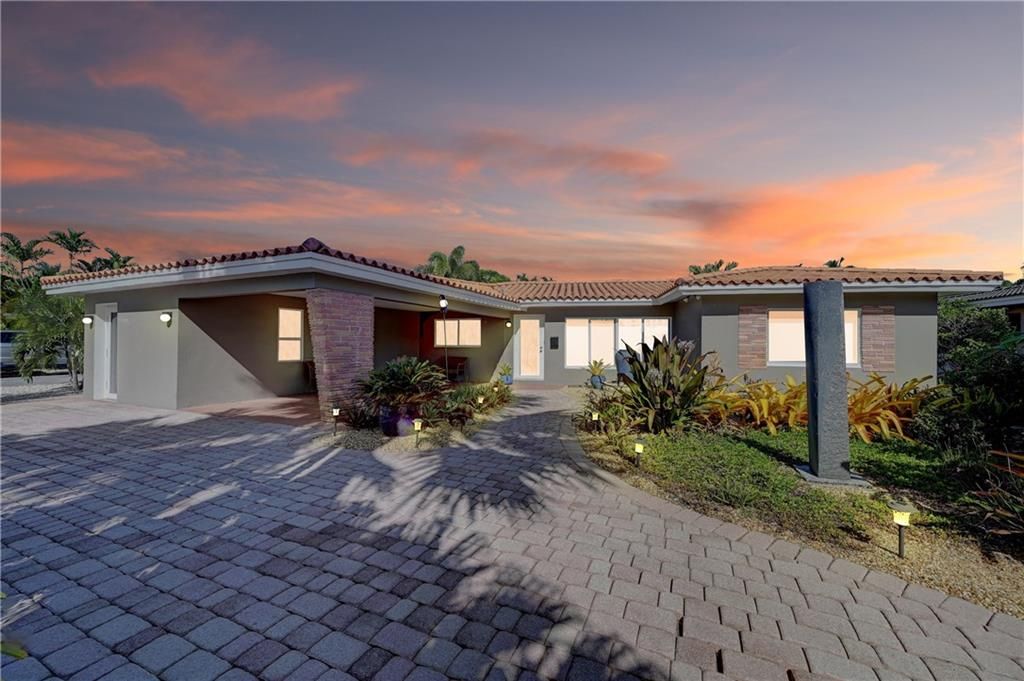 Photo of 1620 Poinsettia Dr Dr, Fort Lauderdale, FL 33305 (MLS # F10340148)